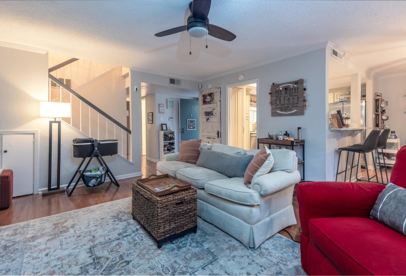 Family room opens to Kitchen and Dining Room.