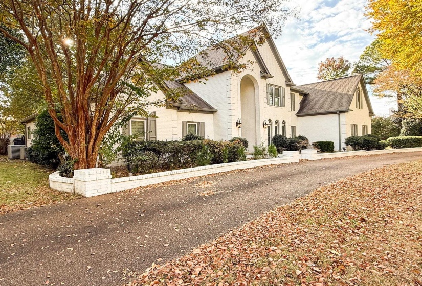 View of front of house featuring brick siding