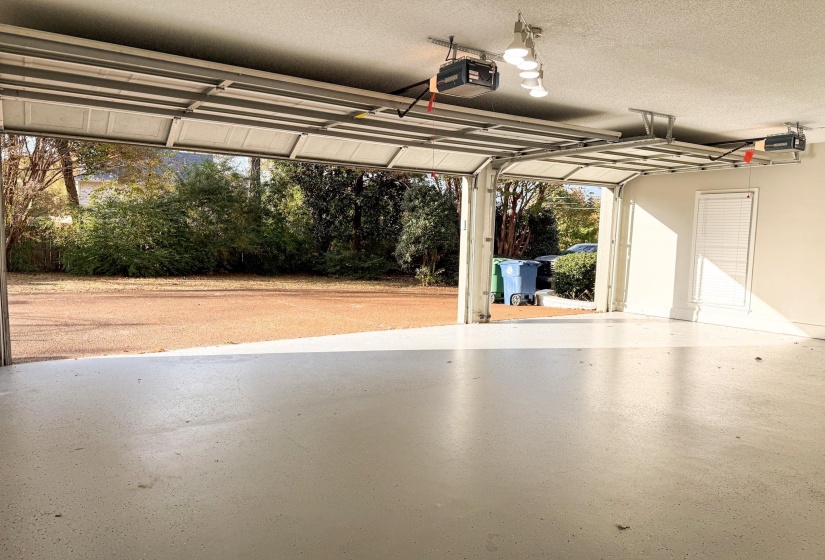 Garage featuring a garage door opener