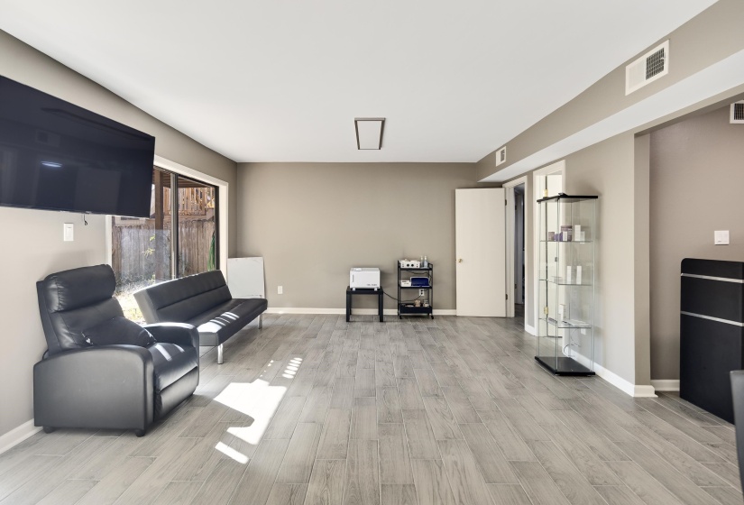 Living area featuring light wood-style floors