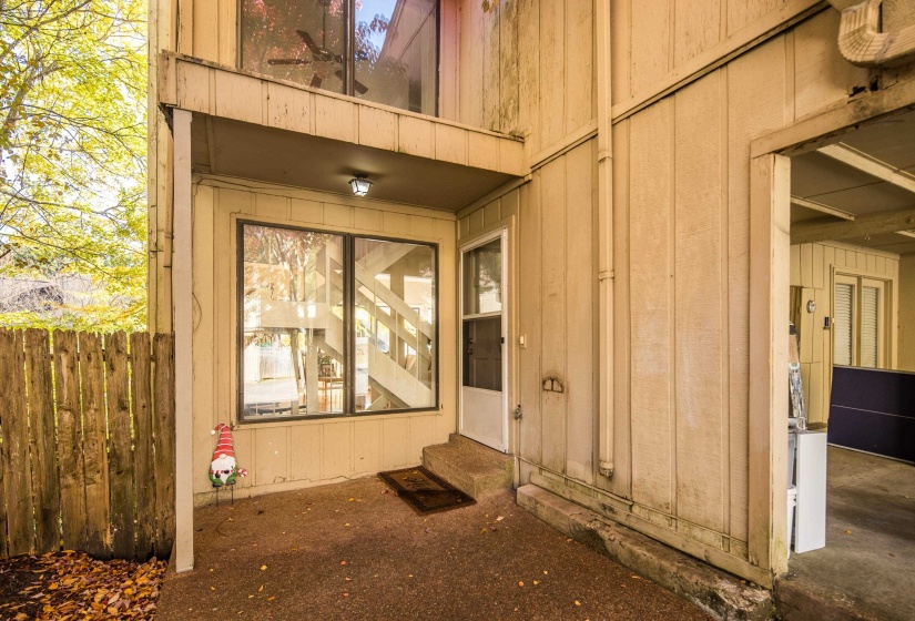 View of exterior entry with board and batten siding