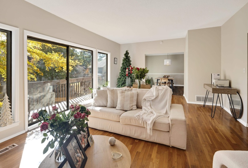 Living room with wood finished floors and baseboards