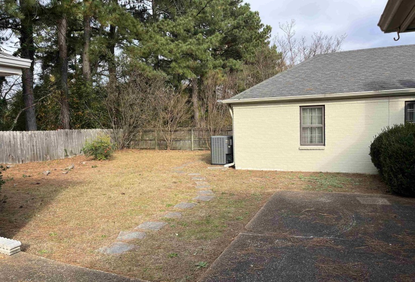 View of fenced backyard