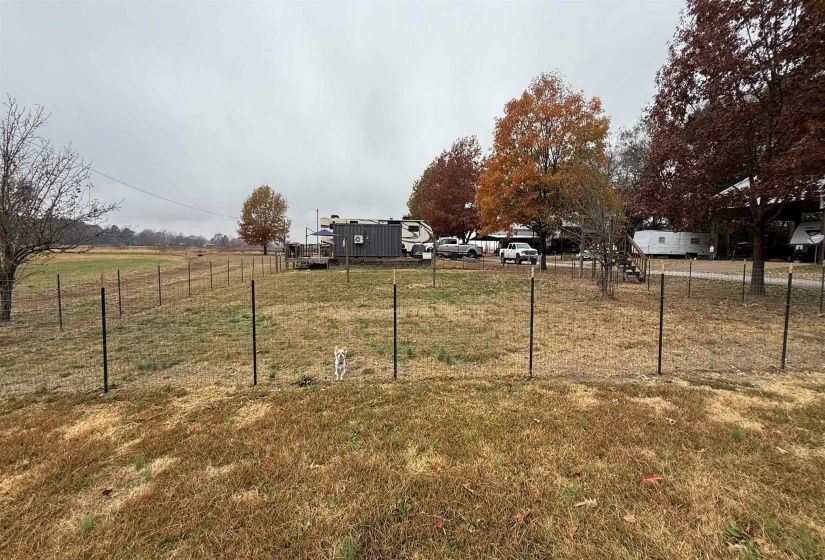 View of yard with a rural view