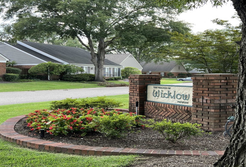Community sign with a yard