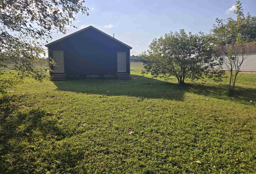 View of the backyard and home