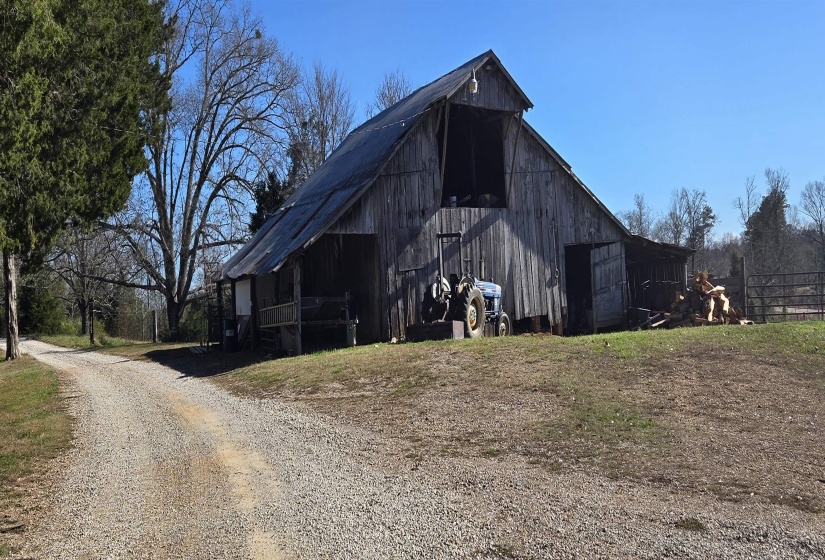 View of barn with driveway