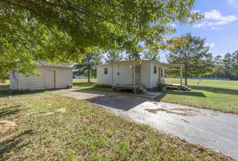 This Property Sits on 1.5 acres and features a 20x20 shop.