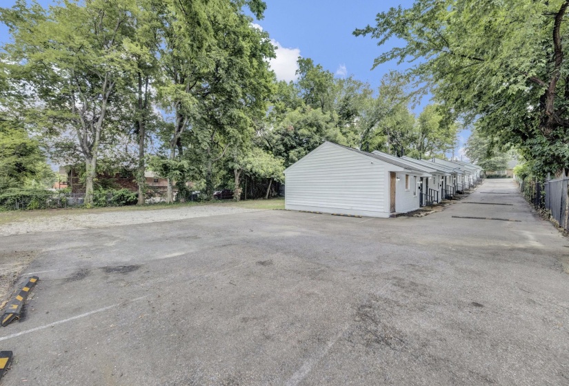 Garage with view of scattered trees