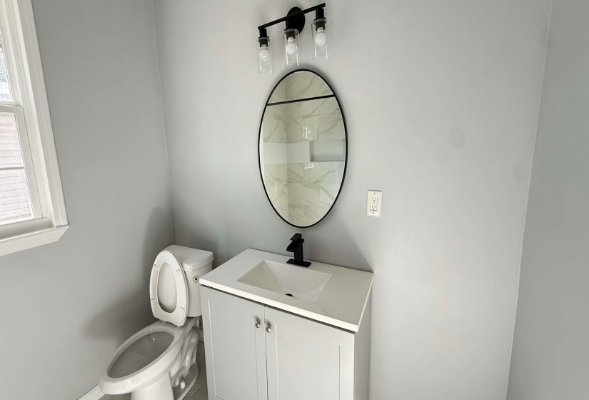 Bathroom with vanity and toilet