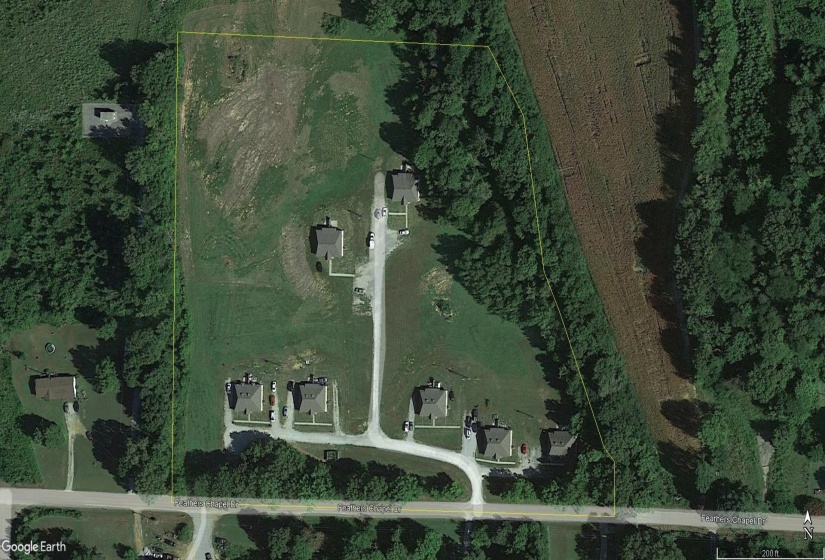Aerial overview of property's location featuring property parcel outlined