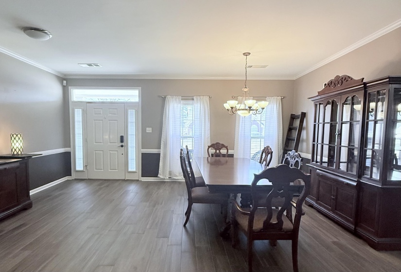 Open dining area, easily accommodates table for 8