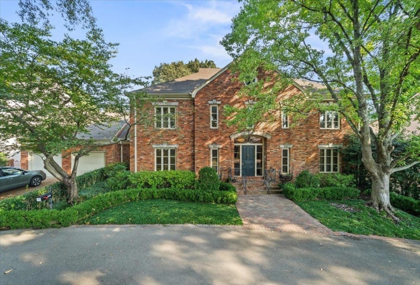 View of front of property with brick siding