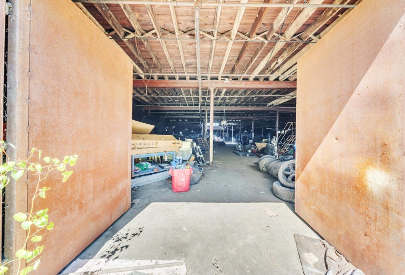 Misc room featuring unfinished concrete floors