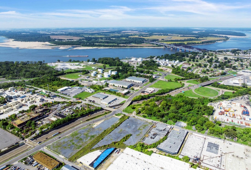 View of property location with a notable bridge and a nearby body of water