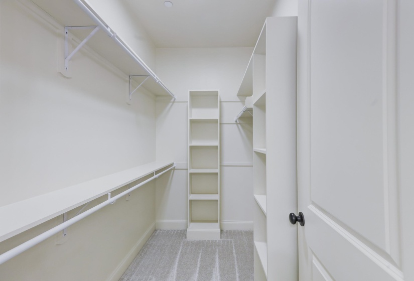 Walk in closet in master bathroom