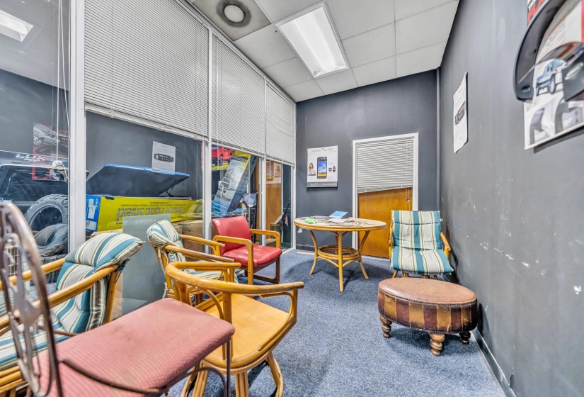 Miscellaneous room with a paneled ceiling