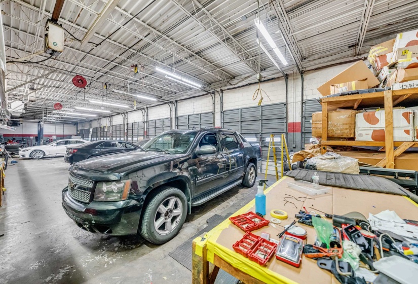 Garage featuring metal wall