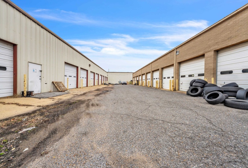 View of road with community garages