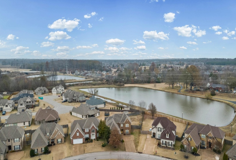 Aerial view of residential area with a nearby body of water
