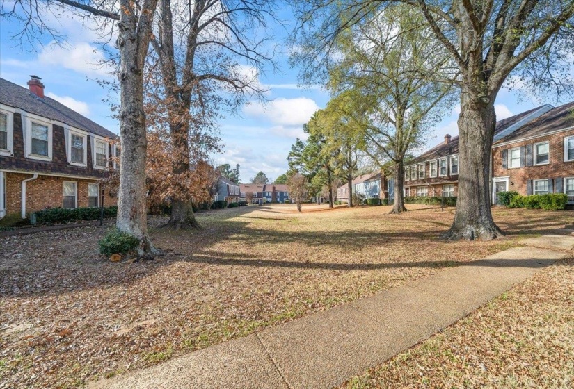 View of home's community featuring a residential view and a lawn