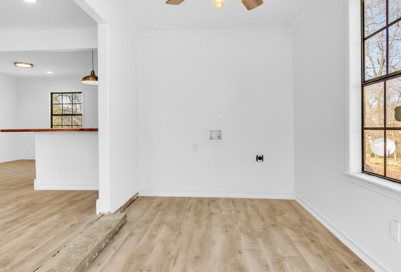 Unfurnished room featuring light wood-style floors, ceiling fan, crown molding, and recessed lighting