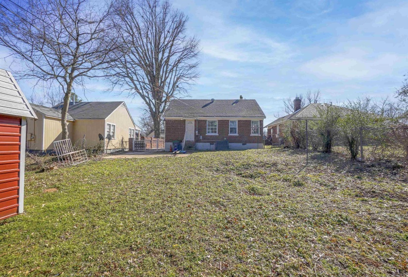 Rear view of house featuring crawl space and a patio area