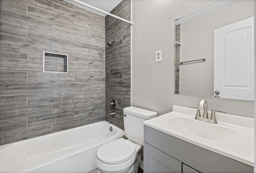 Full bathroom featuring vanity and bathtub / shower combination