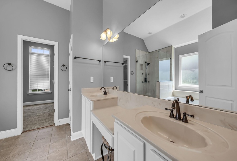 Dual vanity with integrated sinks and bronze-finish hardware
