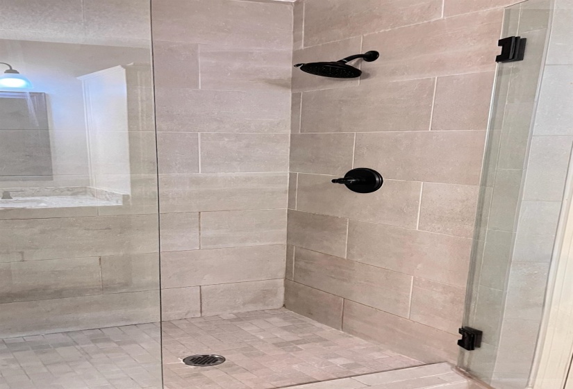 Bathroom with tiled shower