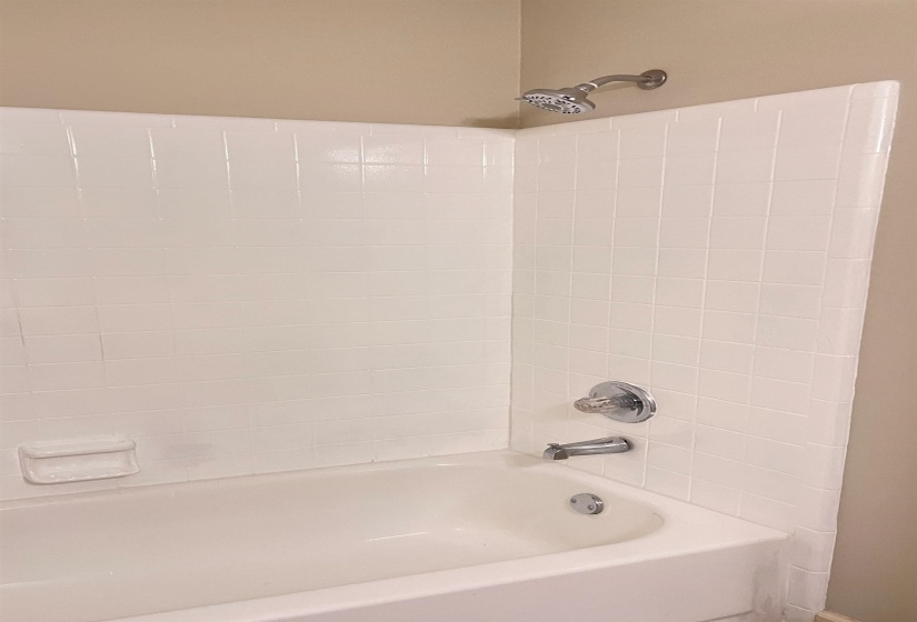 Full bath with shower / bath combination