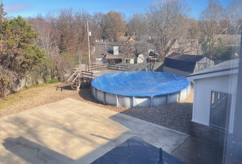 View of pool featuring a covered pool and a patio area