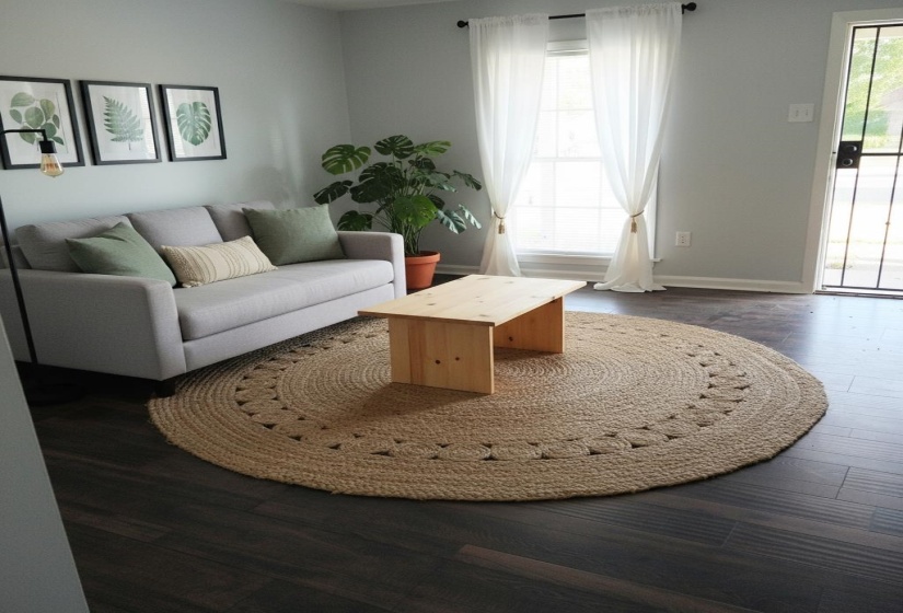 What the living room could look like, when looking from the interior doorway, if it had furniture/curtains and more.