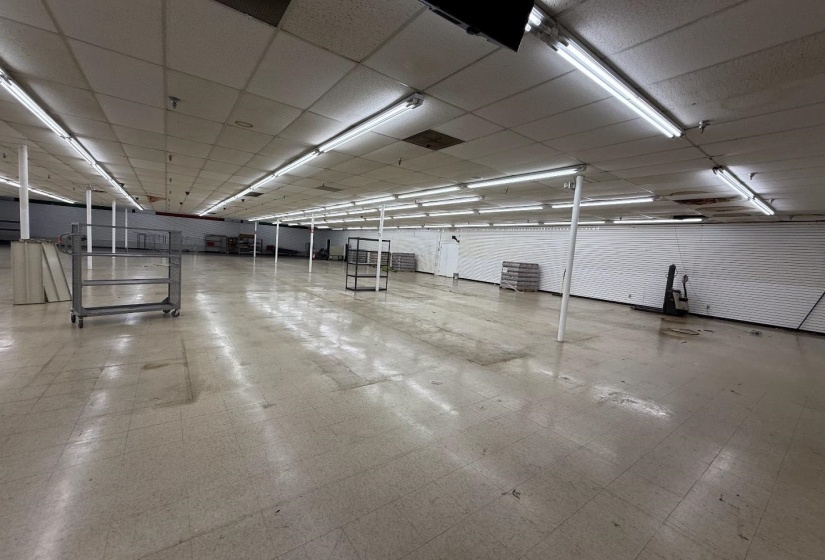 Misc room with a paneled ceiling