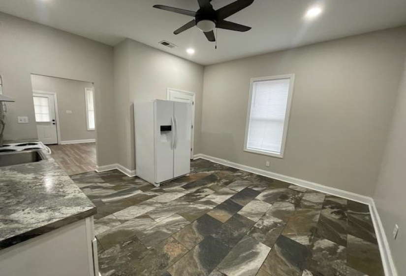 Washroom with ceiling fan and recessed lighting