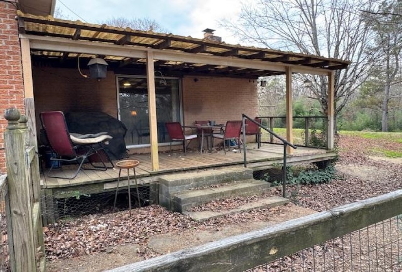View of patio with a deck