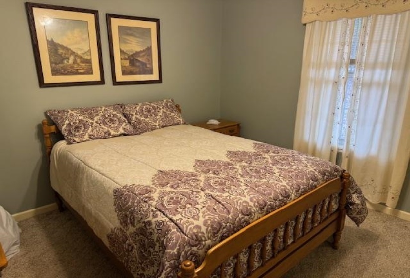 Bedroom featuring carpet