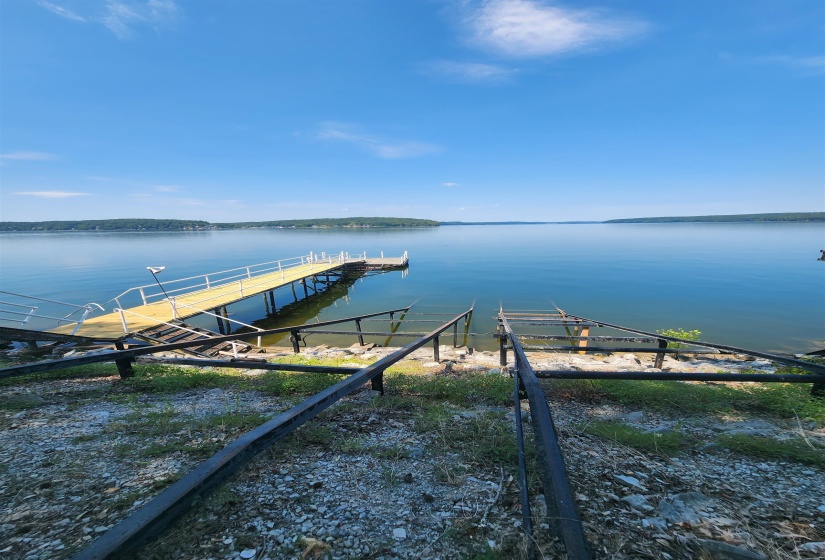 Dock featuring a water view