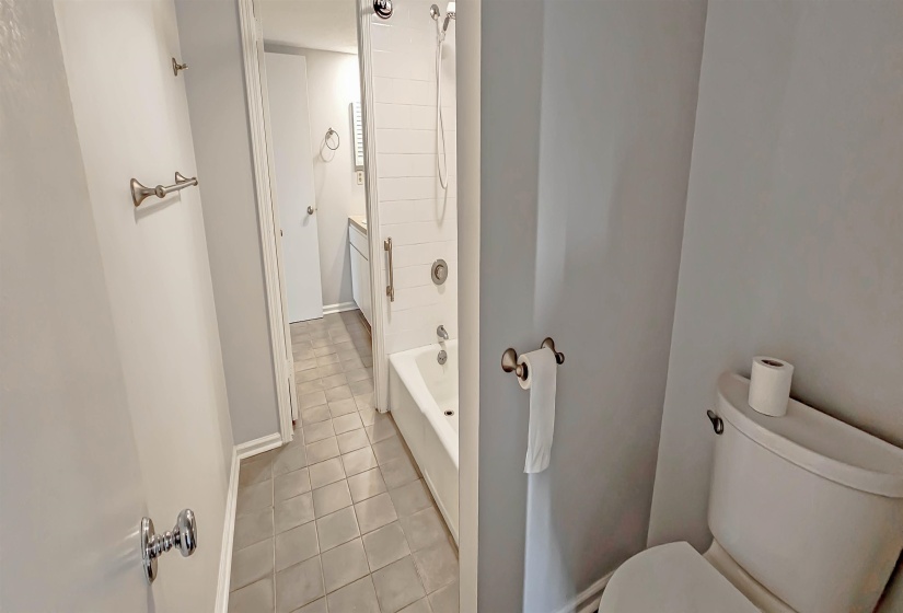 Separate Vanities and toilet areas and a shared tub/shower combo.