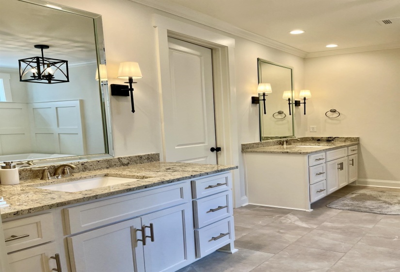 Full bathroom featuring crown molding, vanity, recessed lighting, and a chandelier