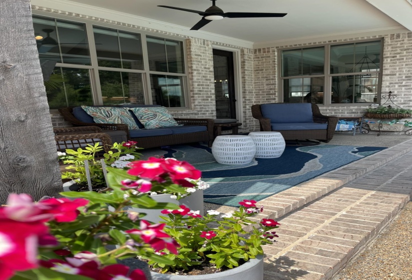 View of patio / terrace featuring an outdoor living space and a ceiling fan