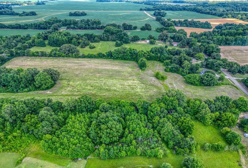 Aerial view of property's location with rural landscape