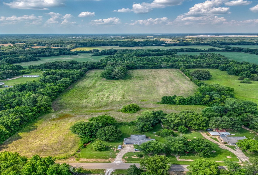 Aerial view of property's location with rural landscape