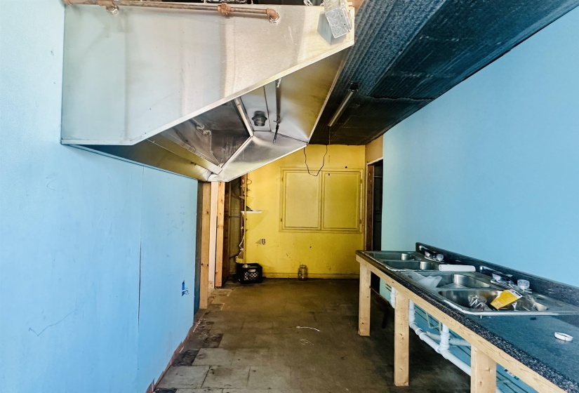 Basement featuring a sink