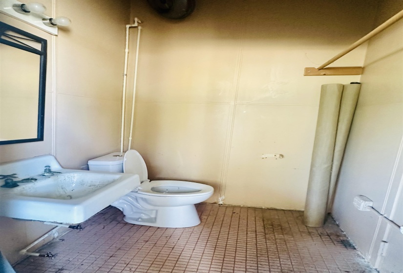 Full bath featuring a sink and a shower with curtain
