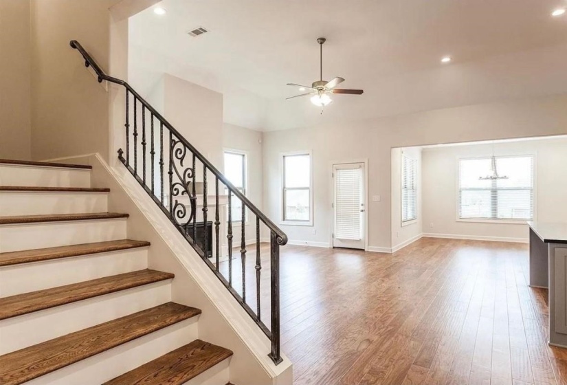 Entryway featuring light wood finished floors, ceiling fan, and recessed lighting
