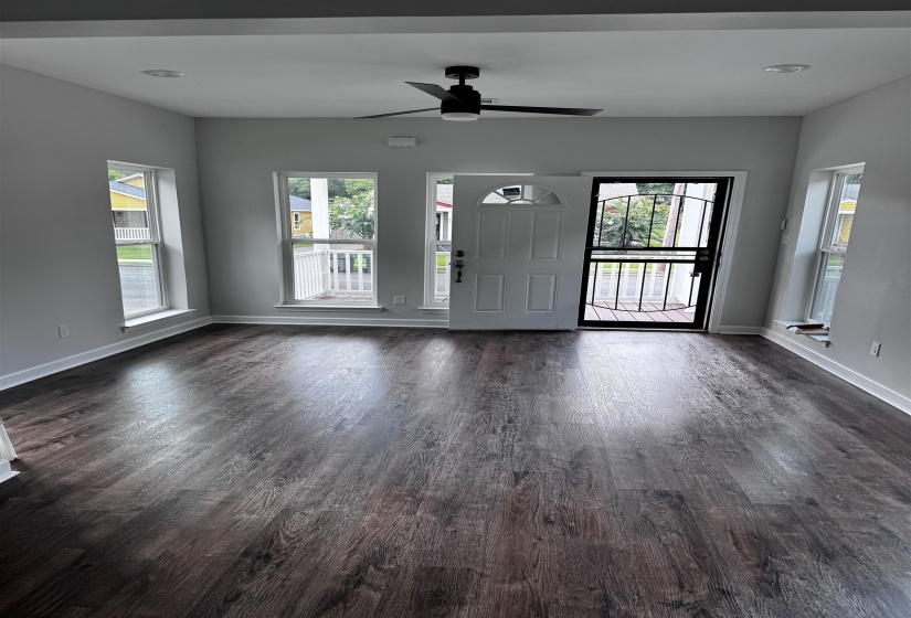 Entryway with plenty of natural light, recessed lighting, dark wood-style floors, and ceiling fan