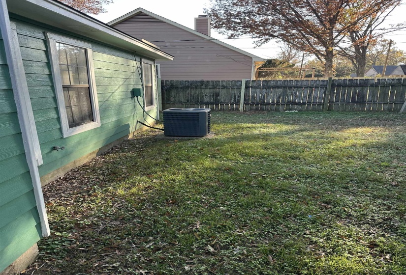 View of yard with central AC unit