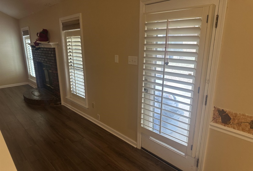 Detailed view of wood finished floors and baseboards