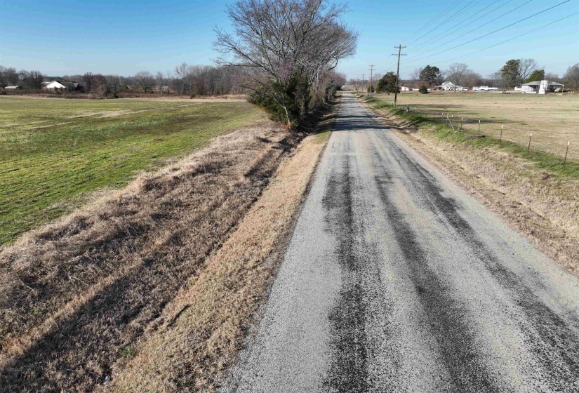 View of asphalt street with a view of countryside